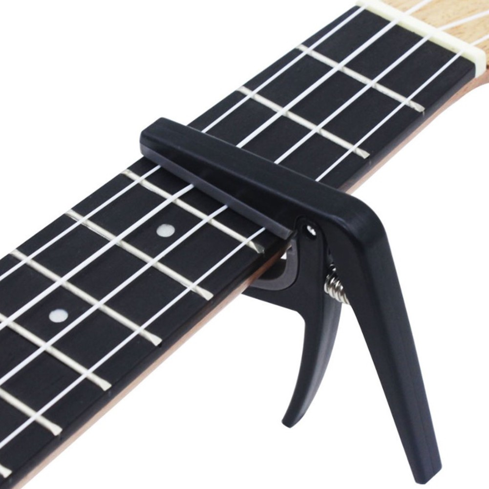 Abrazadera de afinación de gui - Musical Instrument Hawaii reseña y precio