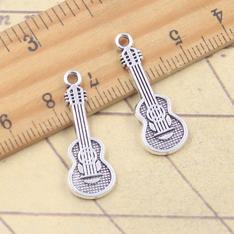 20 piezas dijes instrumento Mu - Musical Instrument Like Guitar reseña y precio