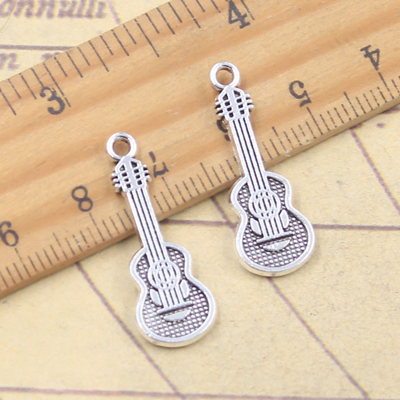 20 piezas dijes instrumento Mu - Musical Instrument Like Guitar reseña y precio